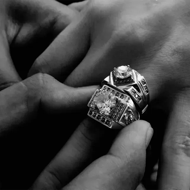 Close of De Beers ring on women's finger