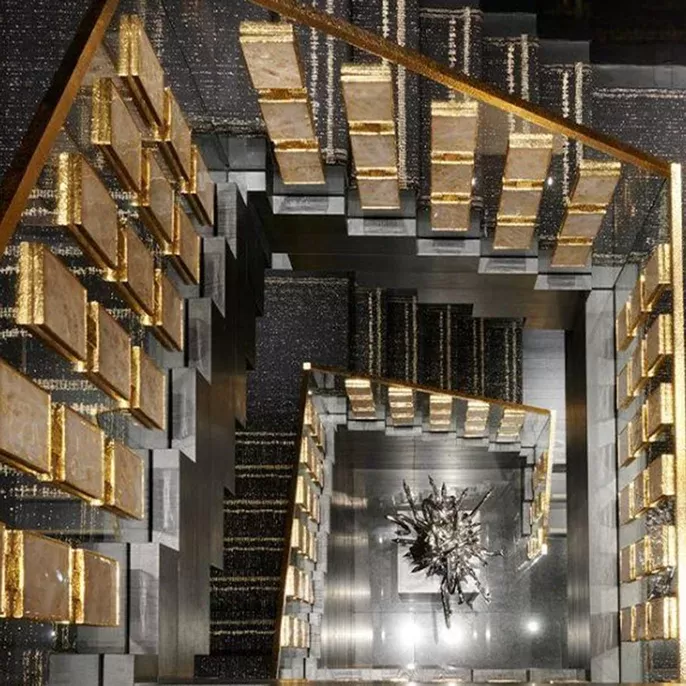 Birds eye view of a black and gold staircase