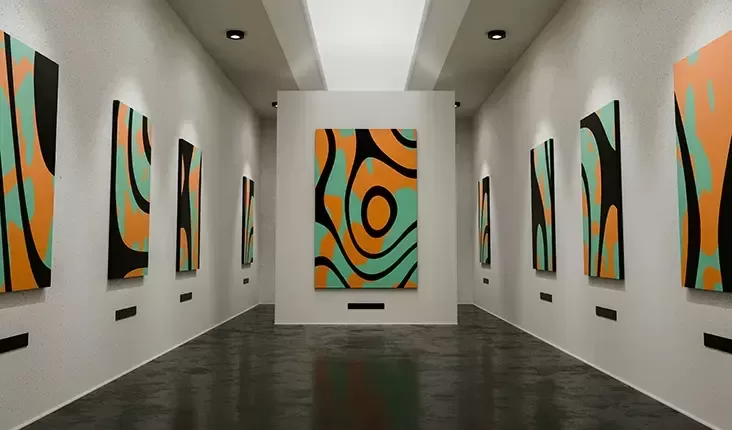An art gallery featuring various paintings displayed elegantly on the walls, showcasing diverse artistic styles and colours.