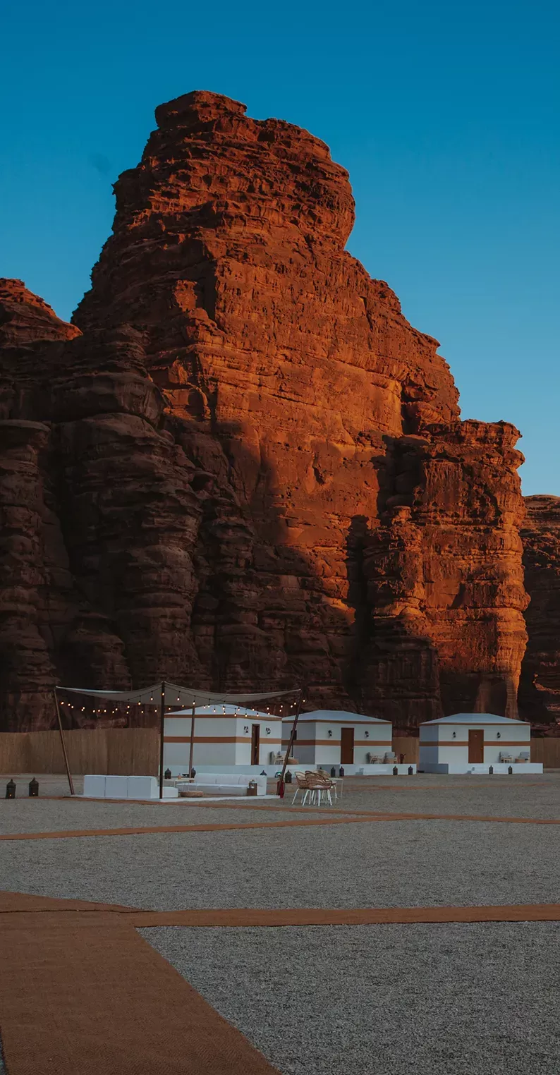 Outside luxury camping lodges amongst the desert and red rocks of NEOM, Saudi Arabia