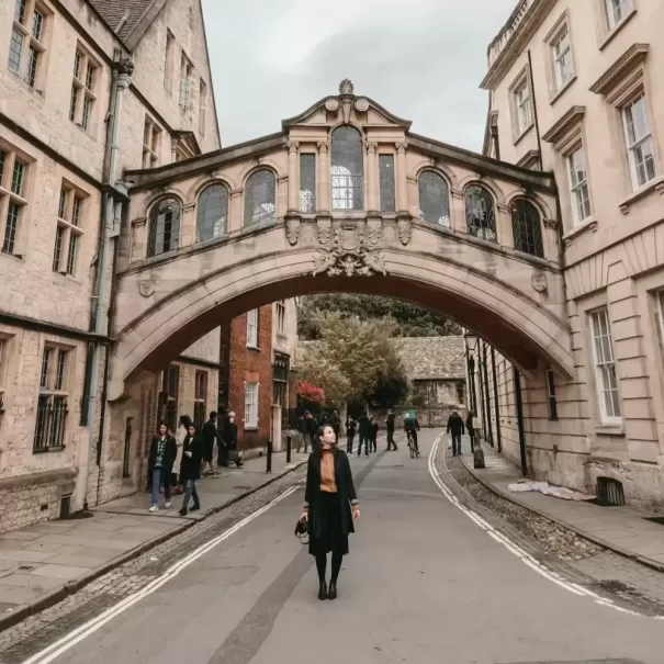 Women walking through grand university campus
