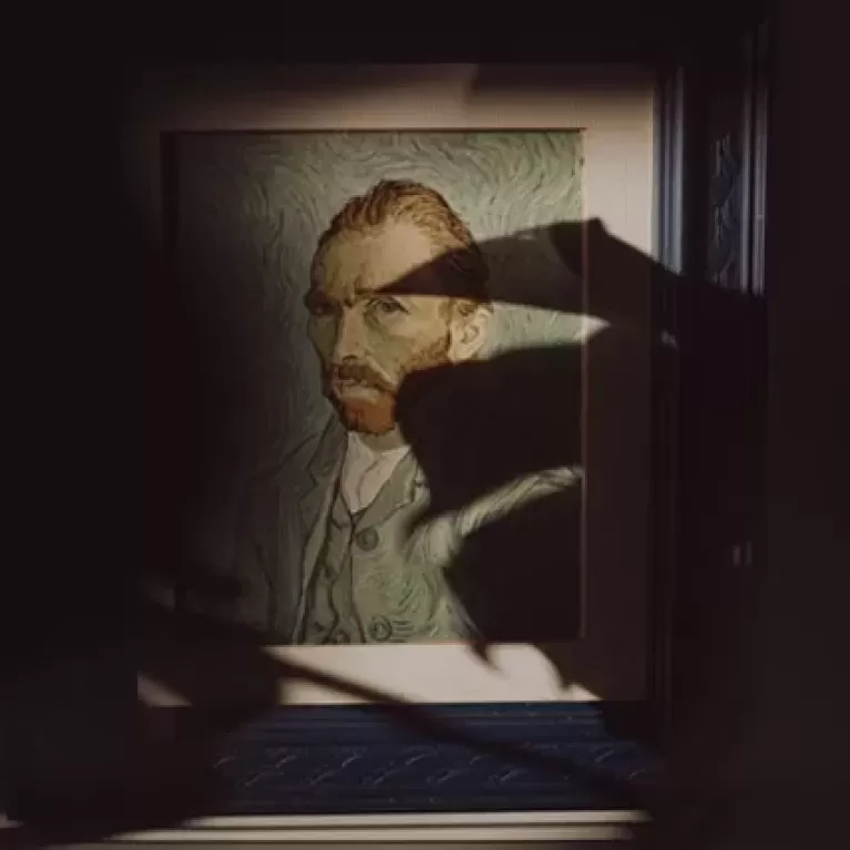Shadow over painting of Vincent Van Gogh self portrait