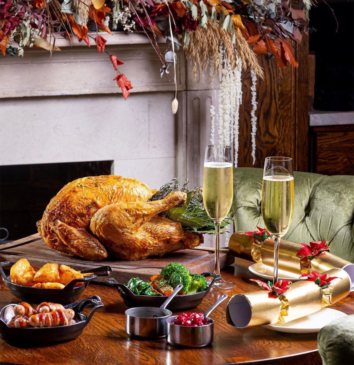 Table set with turkey, trimmings and champagne served at The Cadogan Arms, Chelsea.