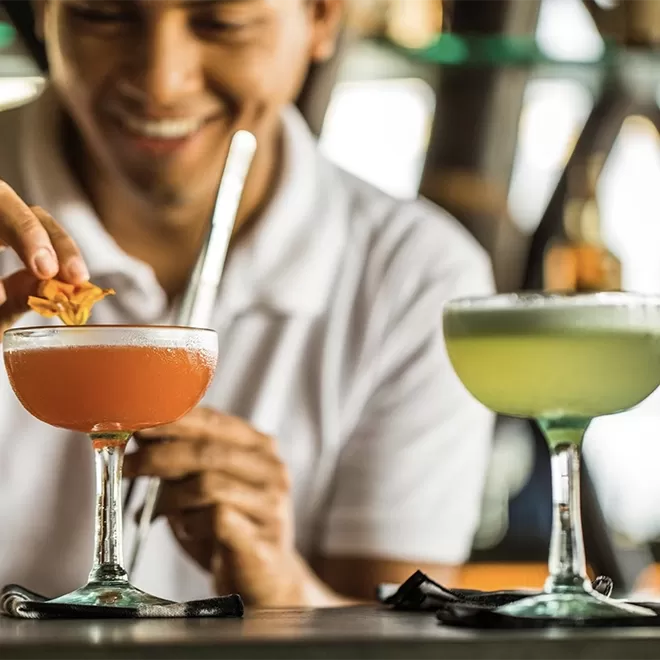 Bartender making martini cocktails at COMO Uma Canggu, Bali