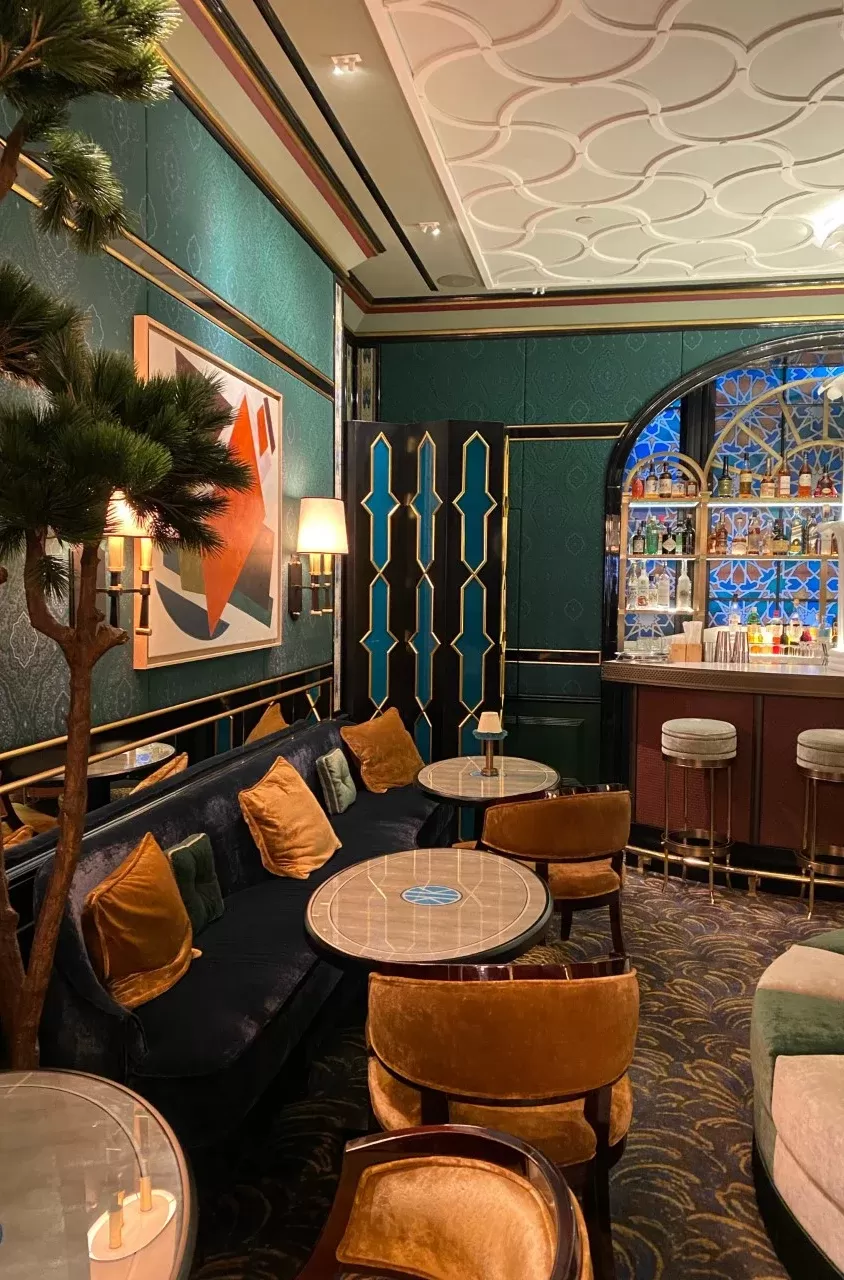 Jewel toned velvet, animal print and gold swanky interior at Caviar Kaspia, Mayfair, London
