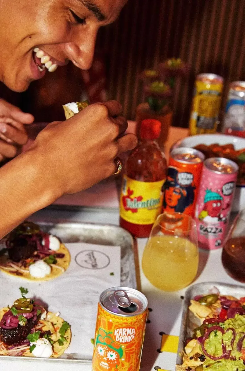 Person eating food at Club Mexicana, Carnaby Street