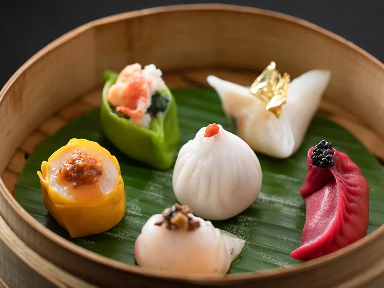 Selection of dim sum in a bamboo steamer at Dim Sum Terrace at Harrods, Knightsbridge