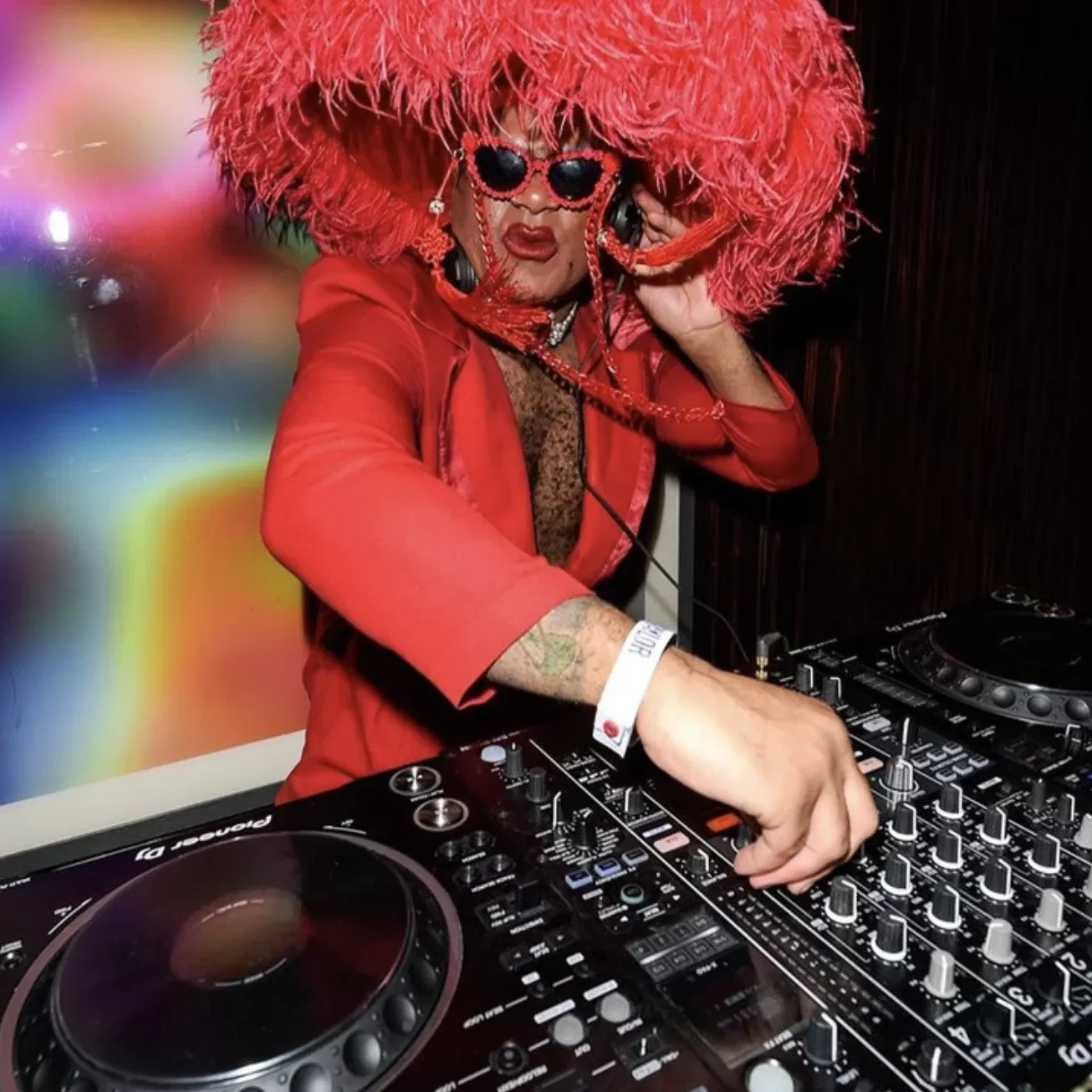 Glamorous DJ preforming at The Dragon Room at Isabel