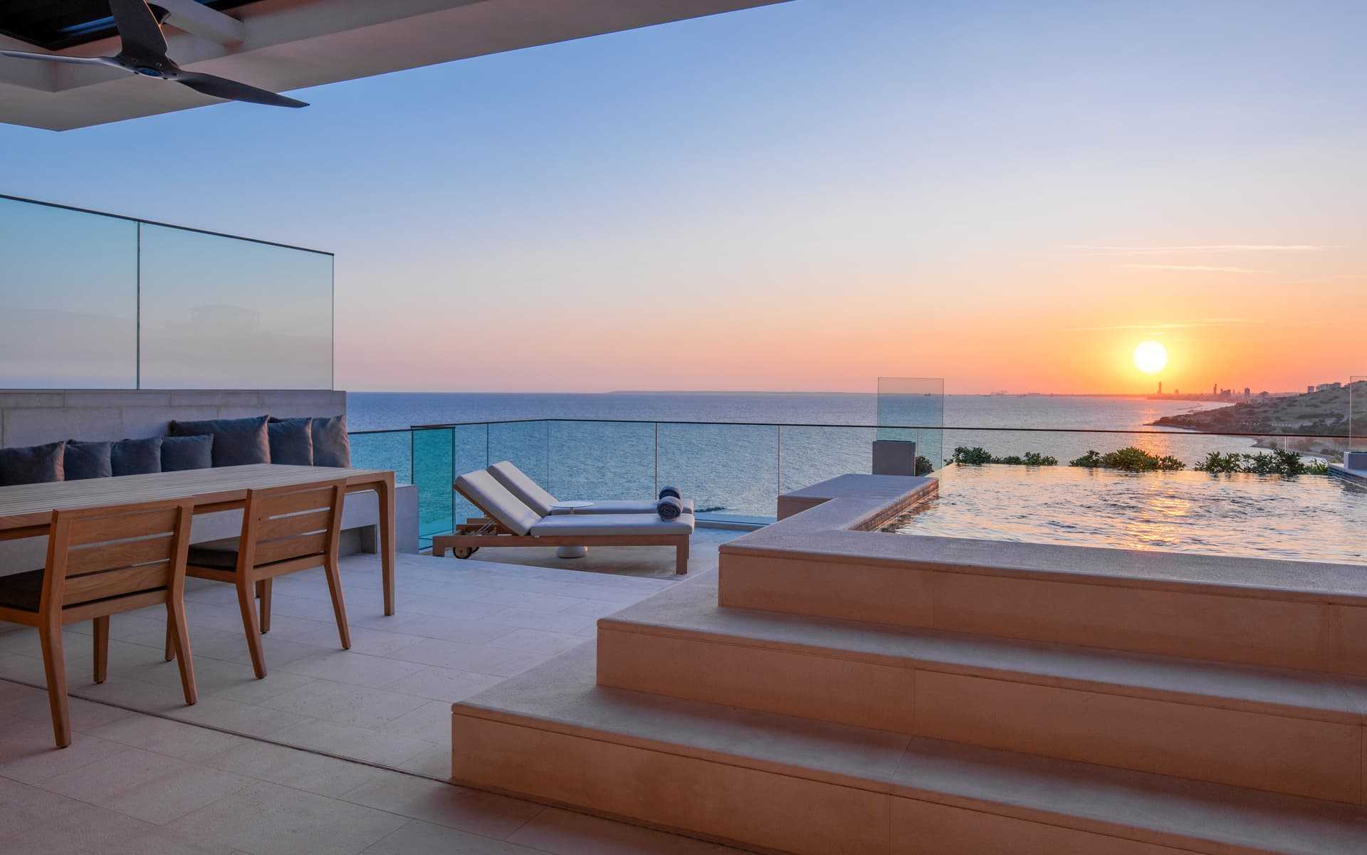 Duplex roof top terrace with private pool, luxury sun beds overlooking the sea and sunset.