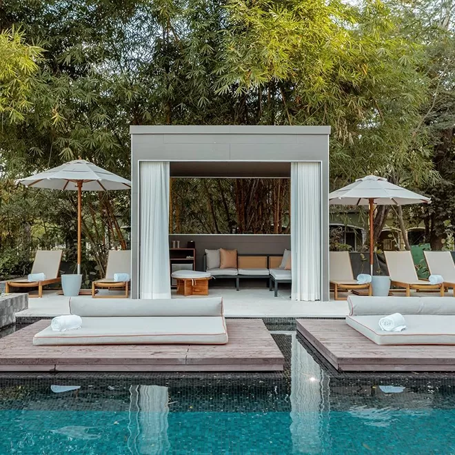 Luxury outdoor swimming pool with private decking and chic luxury lounge space at Guanacaste, Costa Rica