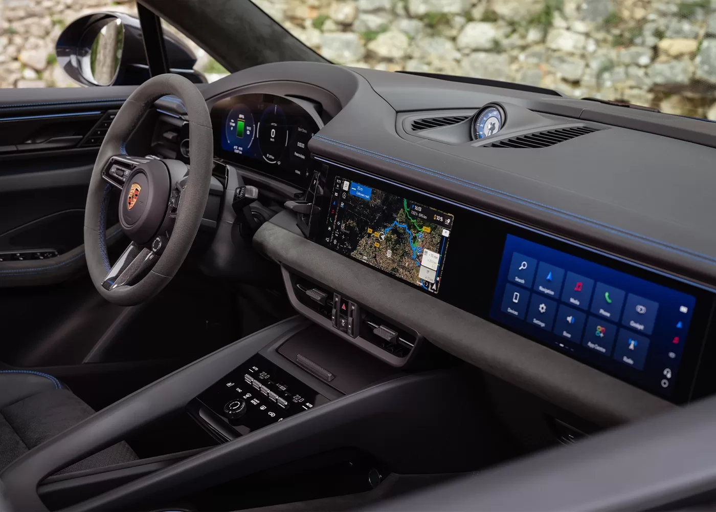 The image shows the interior of a modern car with a digital dashboard, a large central touchscreen displaying navigation and apps, a sleek steering wheel, and premium materials throughout.