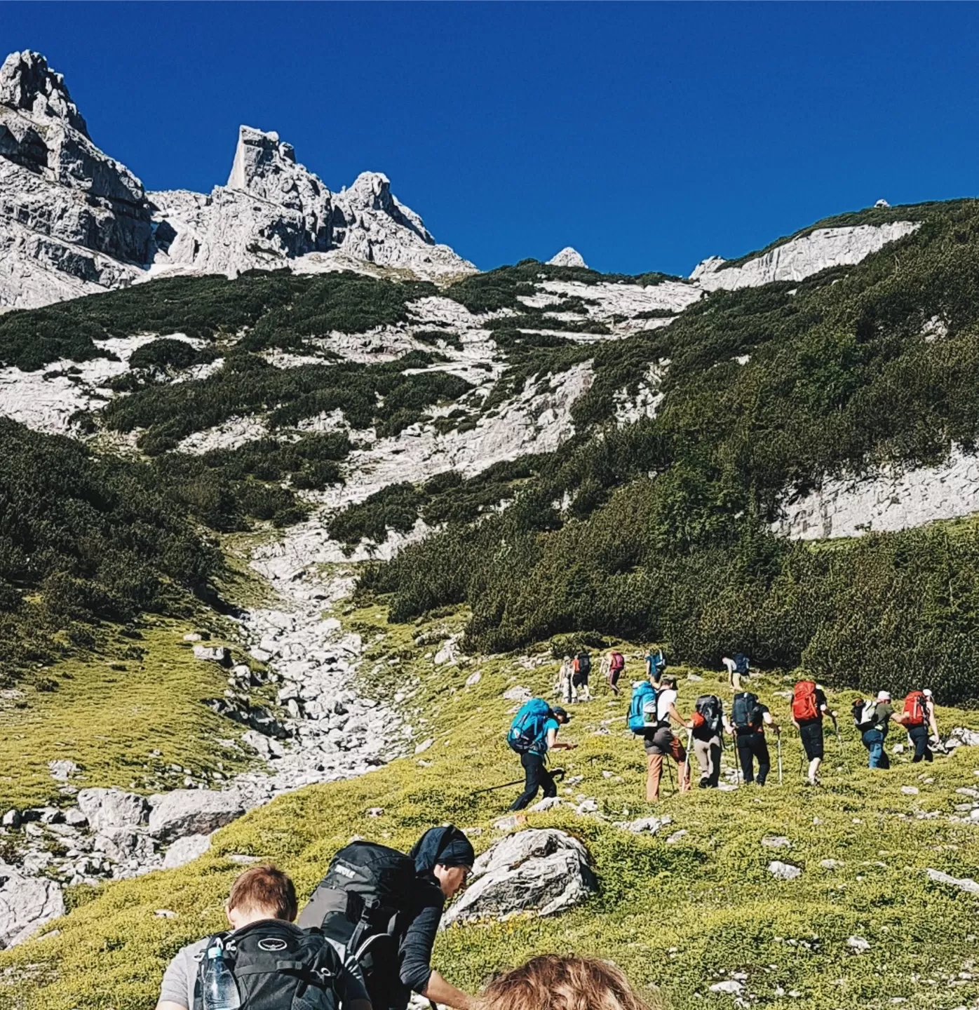 Group of people hiking at Les Elfes International, Switzerland