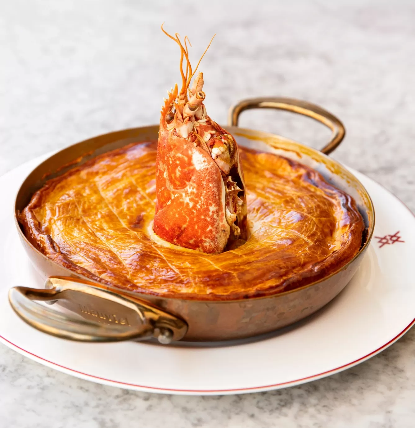 Lobster pie served in a bowl at Mount St. Restaurant, London