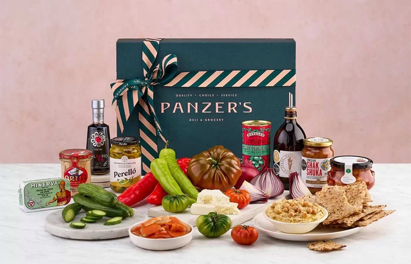 Colourful plates of Mediterranean food laid out surrounding Panzers Mediterranean Style Brunch Box