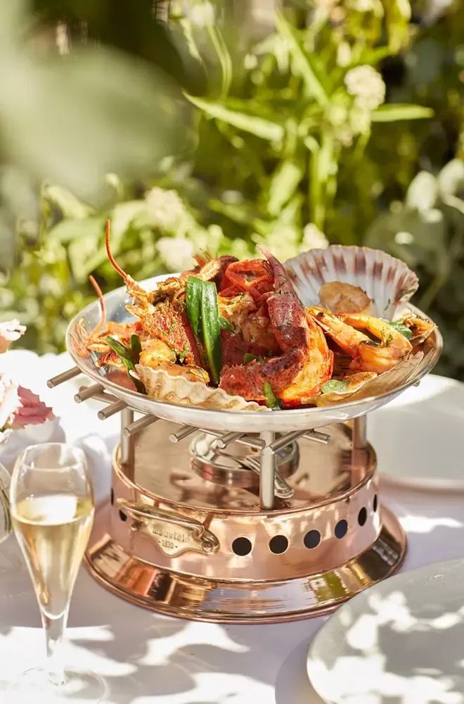 Seafood platter served on a hot plate stand with champagne at Scott's Mayfair, London