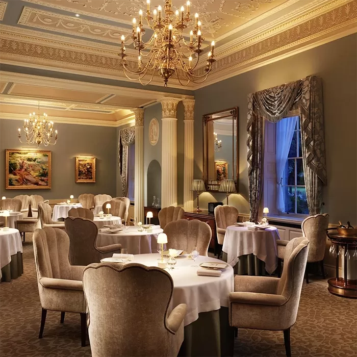 Luxurious pink and golden interior of fine dining restaurant Shaun Rankin at Grantley Hall, North Yorkshire