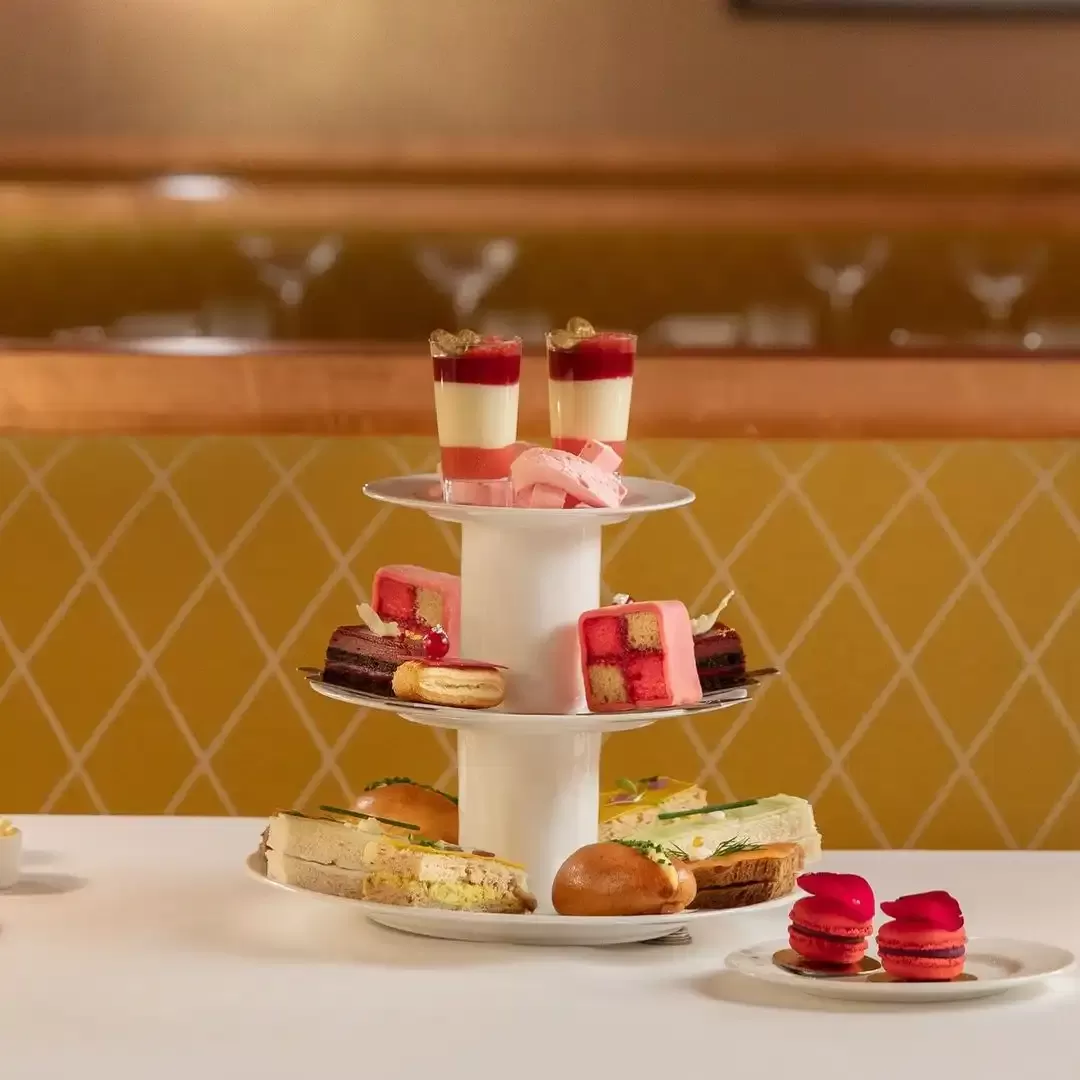 Three-tiered afternoon tea cake display at Sketch, London