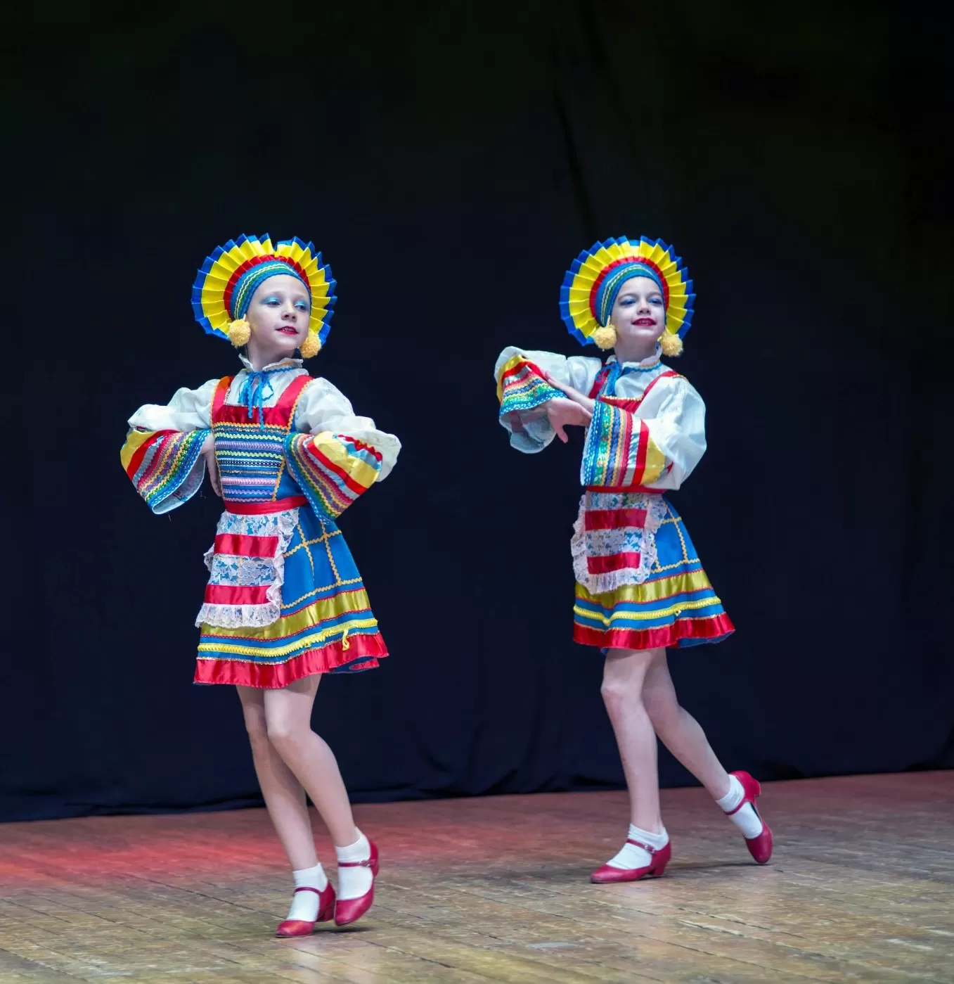 Two girls in costumes performing at Stage Door Manor, US