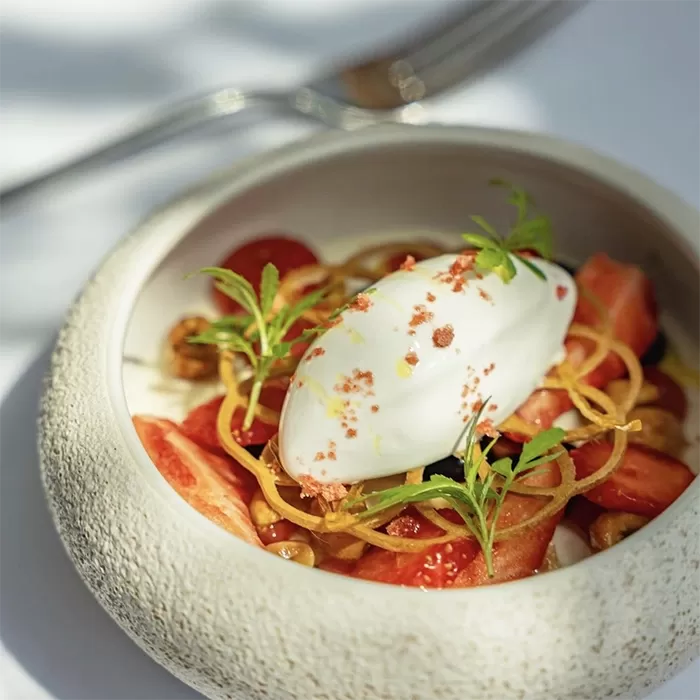 Luxurious cuisine served in a stone bowl plate at Star Inn at Harome, North Yorkshire