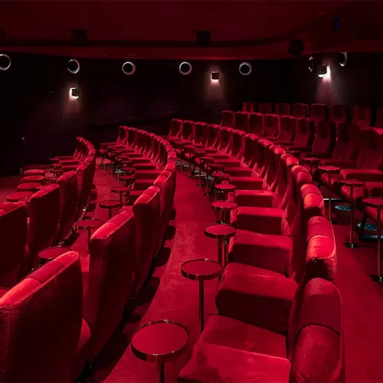 Red velvet cinema seats at The Cinema at Selfridges London.