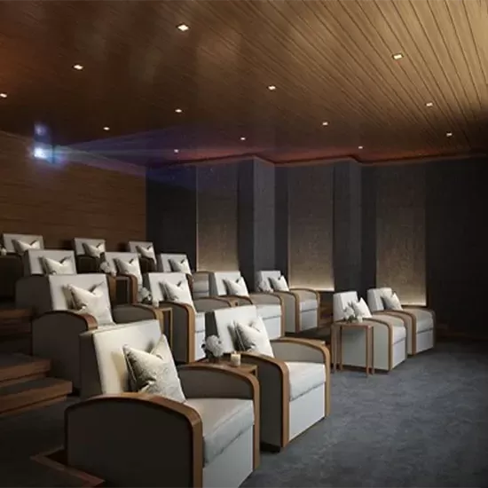 Cinema seats in rows and spotlight ceiling at The Cinema at The Peninsula London.