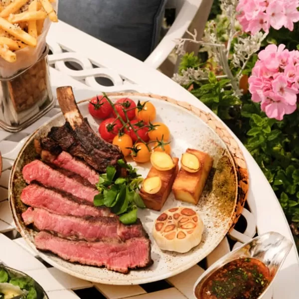 Posh steak and chips served at The Dorchester Rooftop, Mayfair, London