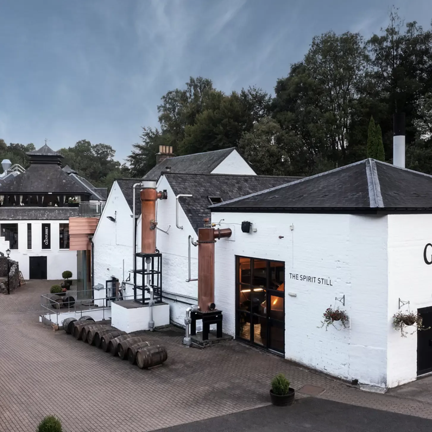 Exterior of white distillery building of The Glenturret, Perthshire, Scotland