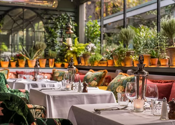 Luxury restaurant interior of The Ivy Garden, Chelsea, London