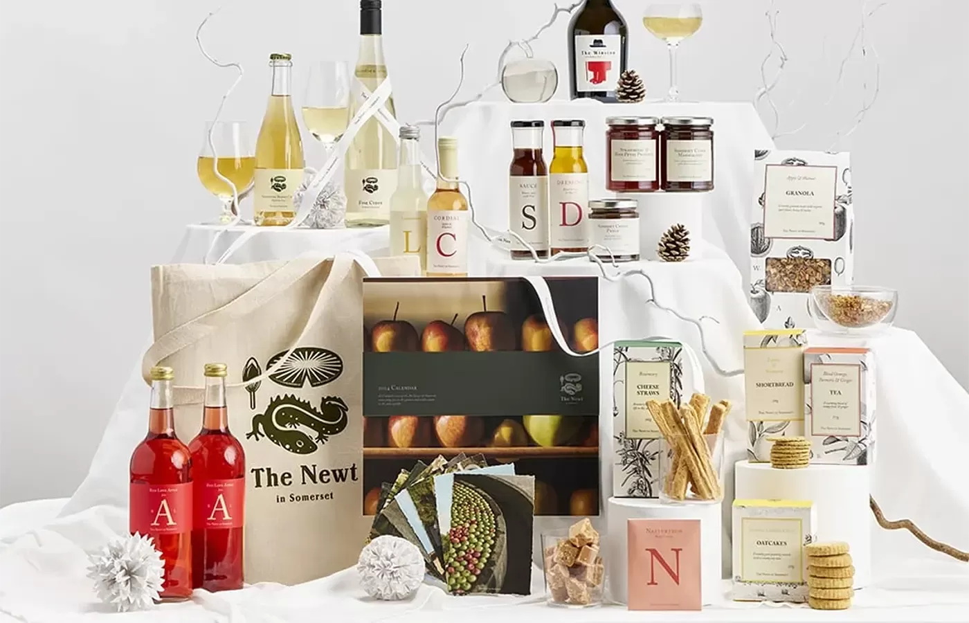 Food and drink surrounded by The Newt Somerset Cheese Cyder Hamper
