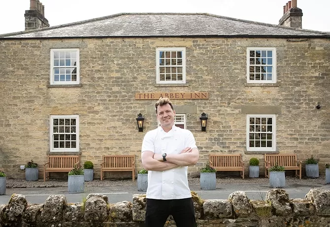 Michelin-starred chef Tommy Banks outside his restaurant The Abbey Inn, North Yorkshire