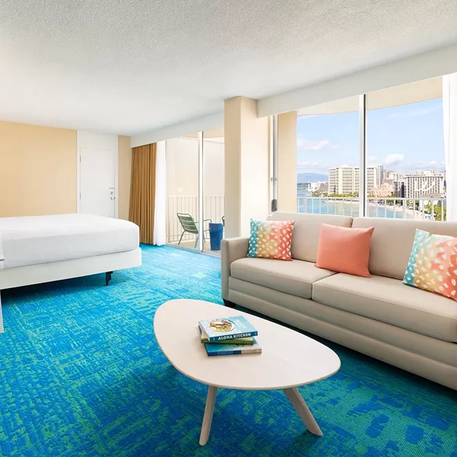 Minimalistic hotel suite with a view of sea and city at Waikiki, Hawaii