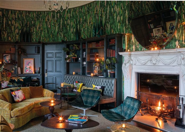 Cosy lounge room with fireplace at The Grove, Hertfordshire