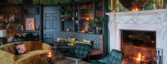 Cosy lounge room with fireplace at The Grove, Hertfordshire