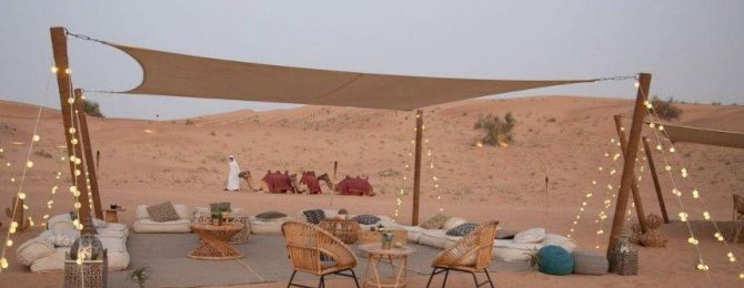 Outside lounge area with fairy lights in desert
