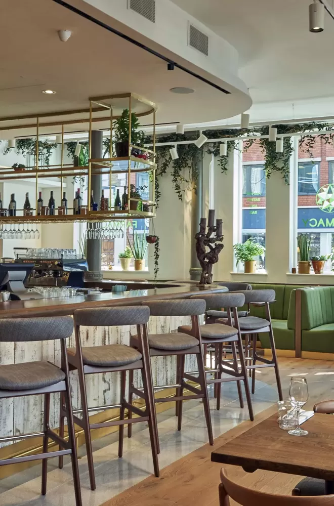 Luxury restaurant interior and bar at Farmacy, Notting Hill