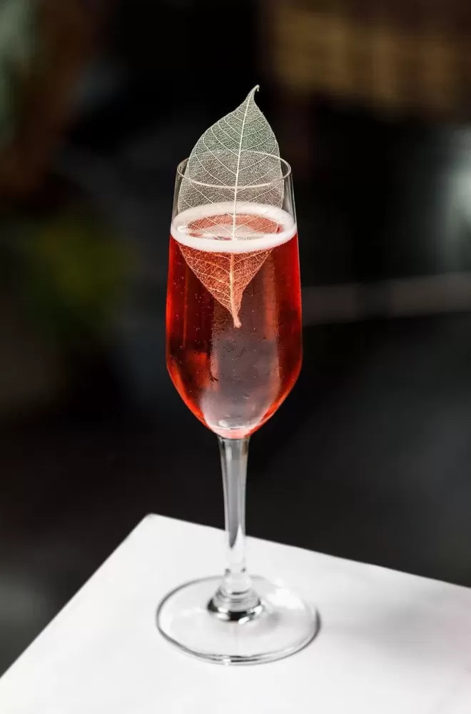 Rose champagne served with a gold leaf at Mildreds, London