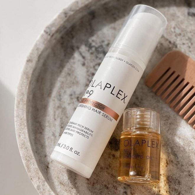 Olaplex bottles in a marble sink