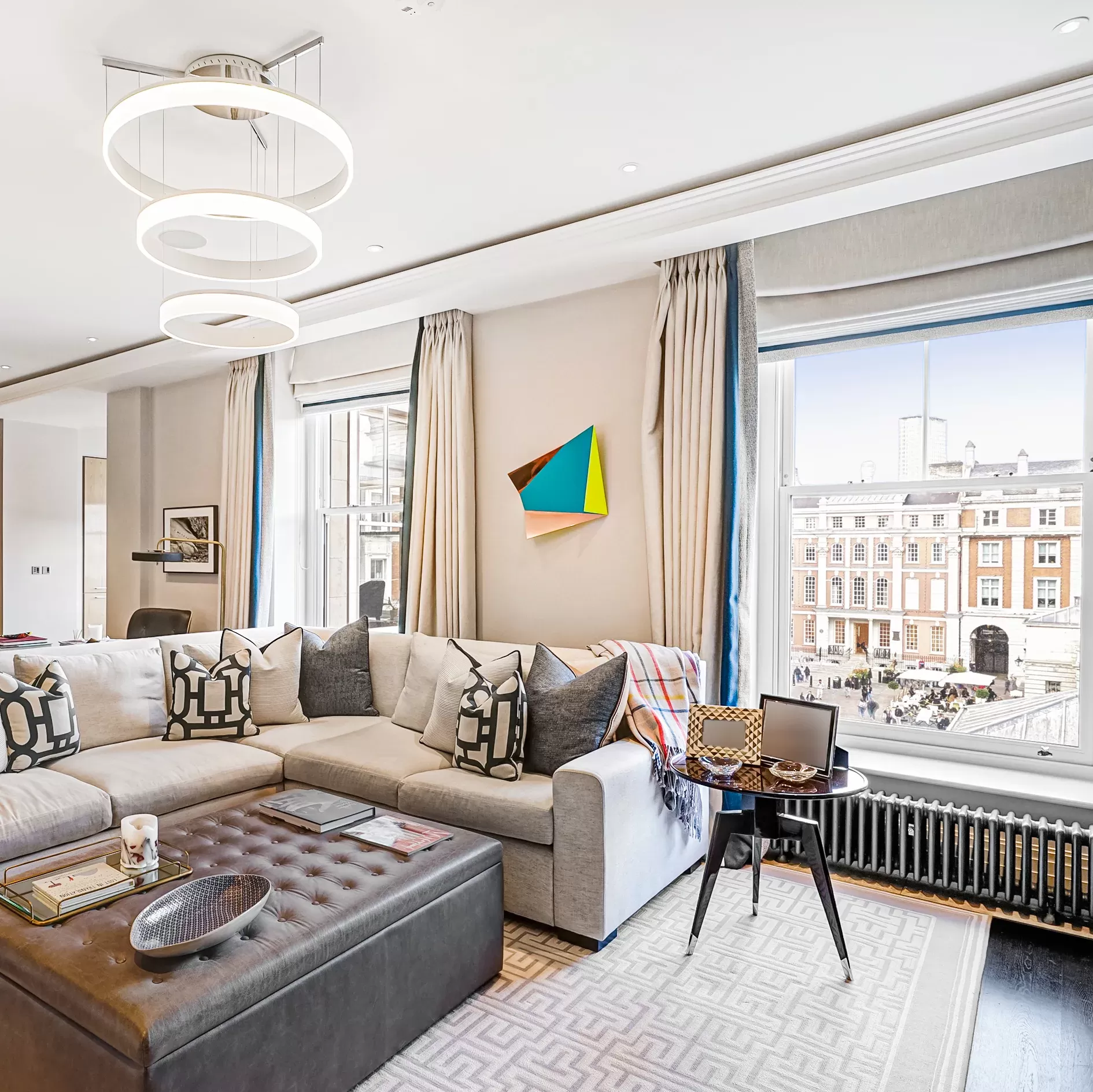 Inside living room interior of luxury apartment with view of London highstreets